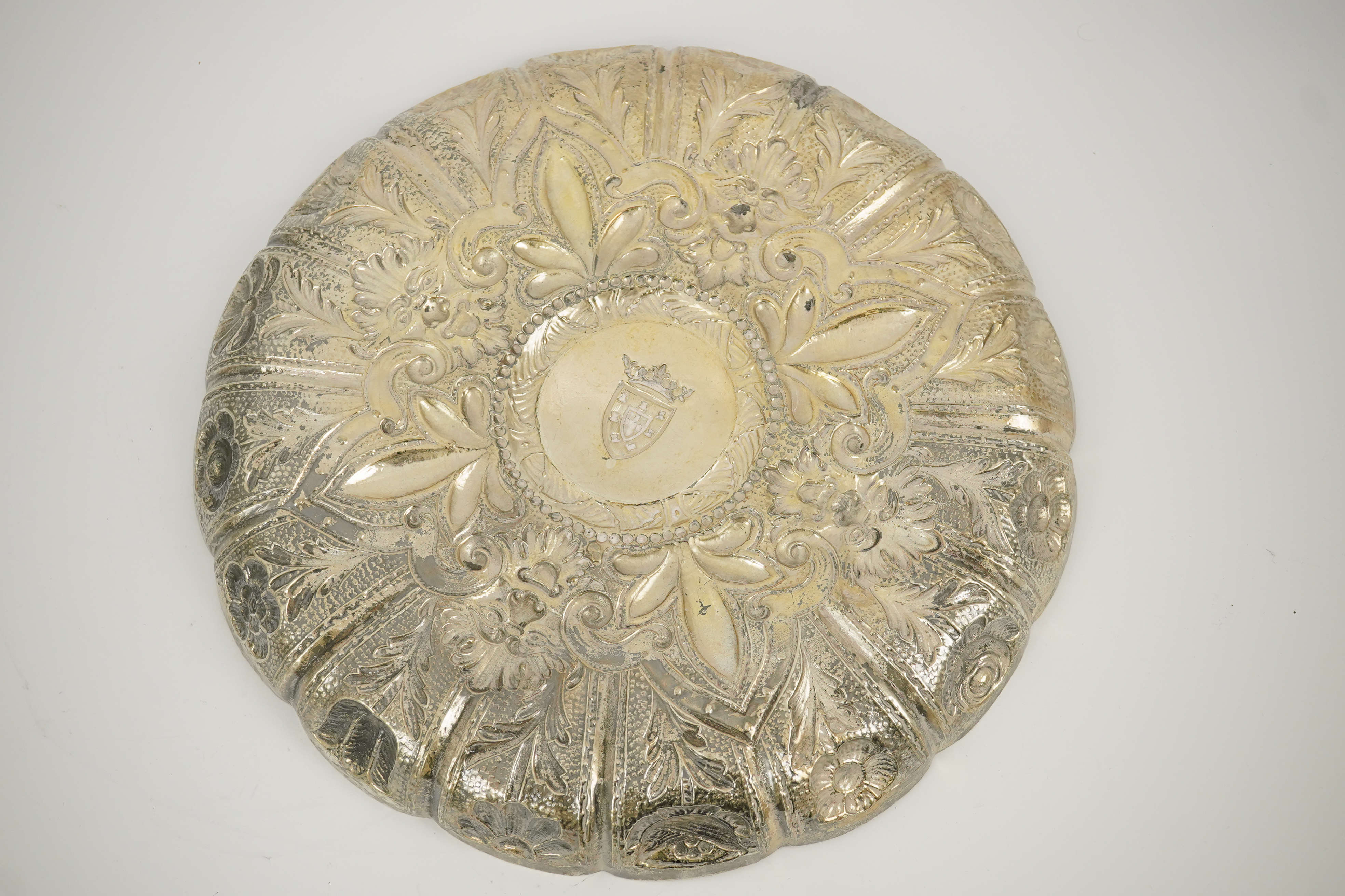 A late 19th/early 20th century Portuguese 833 standard embossed silver shallow dish